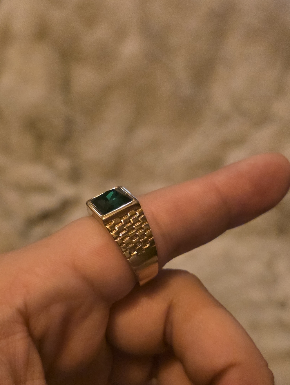 Gold Rolex ring